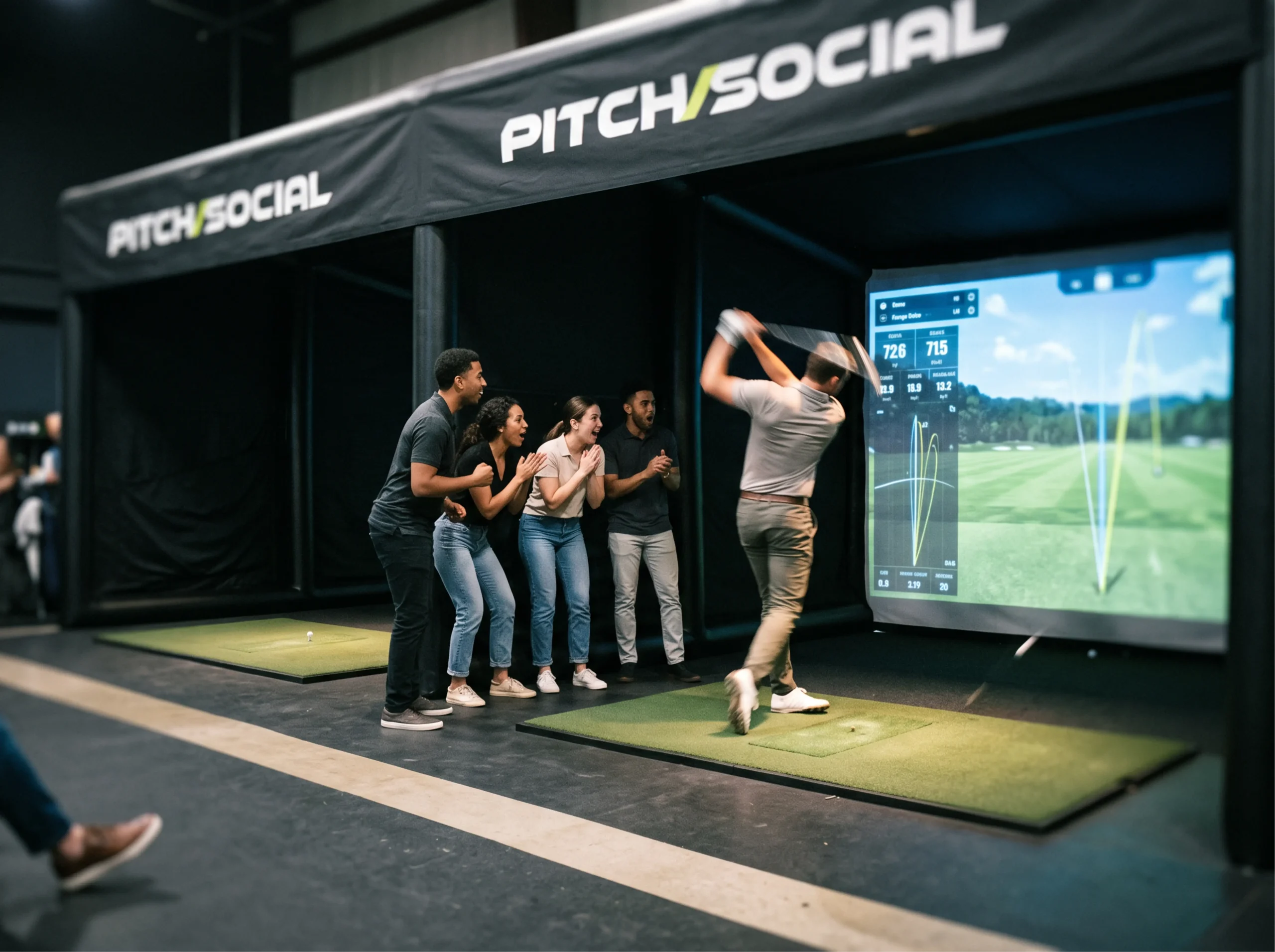Golfer swinging in a Pitch Social simulator bay while friends watch